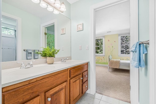 10 Whitney Rd, Stow, MA 01775 - ensuite bathroom featuring plenty of natural light, tile patterned floors, and double vanity