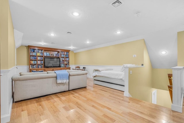 10 Whitney Rd, Stow, MA 01775 - living area with wood finished floors, a wainscoted wall, recessed lighting, and built in features