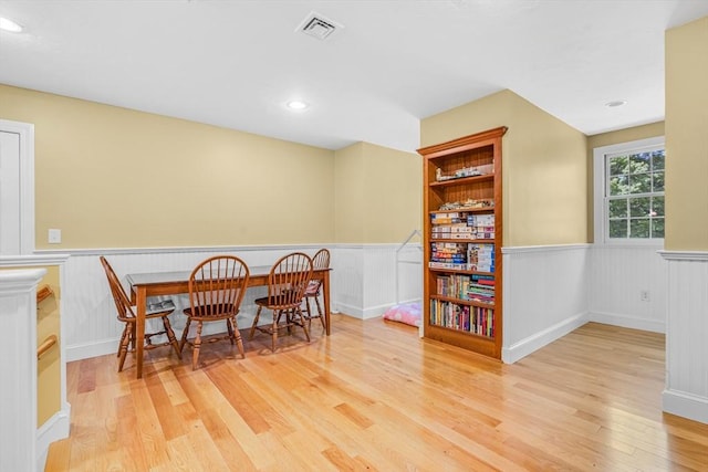 10 Whitney Rd, Stow, MA 01775 - dining space with wood finished floors, wainscoting, recessed lighting, and a decorative wall
