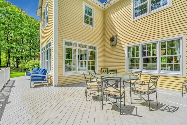 10 Whitney Rd, Stow, MA 01775 - wooden deck featuring outdoor dining area
