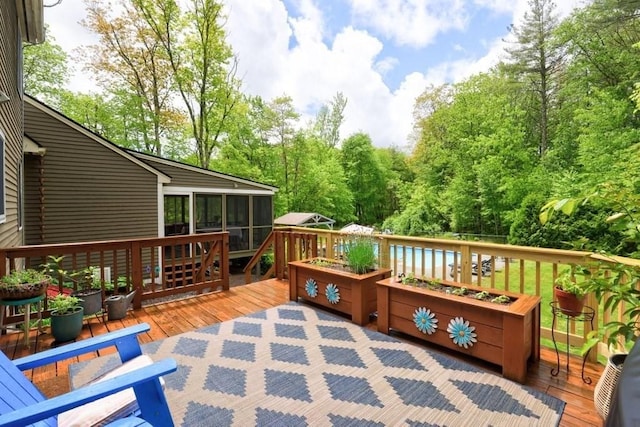 83 Everett Rd, Barre, MA 01005 - deck featuring a sunroom