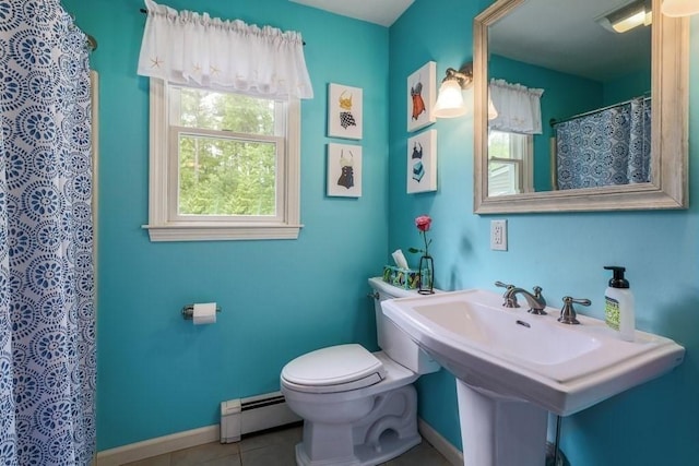 83 Everett Rd, Barre, MA 01005 - full bath featuring a baseboard radiator, toilet, tile patterned flooring, and baseboards