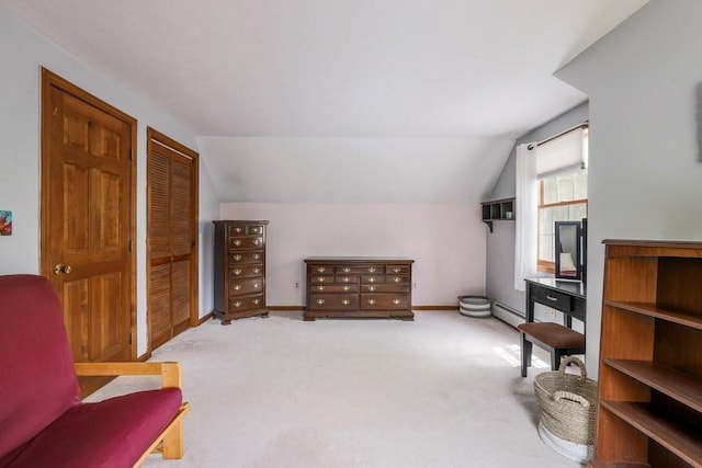 83 Everett Rd, Barre, MA 01005 - living area with lofted ceiling, a baseboard radiator, carpet flooring, and baseboards