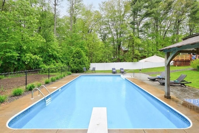 83 Everett Rd, Barre, MA 01005 - view of swimming pool with a fenced backyard, a diving board, a gazebo, a patio area, and view of scattered trees