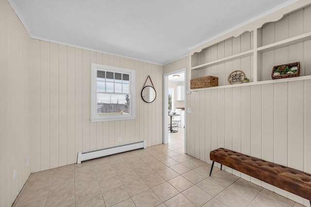 mudroom featuring a baseboard radiator, tile patterned floors, and crown molding