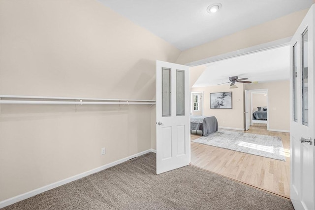 unfurnished bedroom with carpet and baseboards