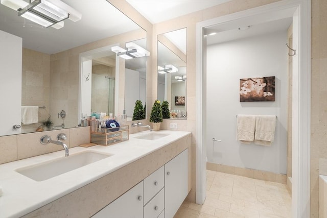 500 Atlantic Ave Unit 15M, Boston, MA 02110 - full bathroom with double vanity and tile patterned floors