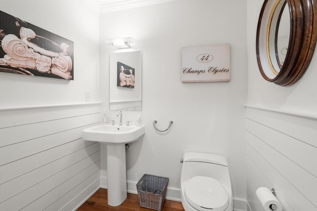 500 Atlantic Ave Unit 15M, Boston, MA 02110 - half bathroom with crown molding and wood finished floors