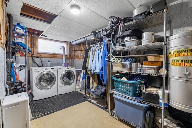 laundry area with laundry area and independent washer and dryer