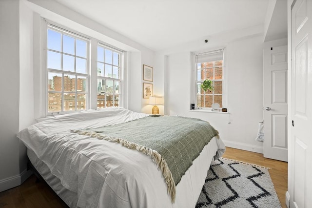 bedroom featuring hardwood / wood-style flooring