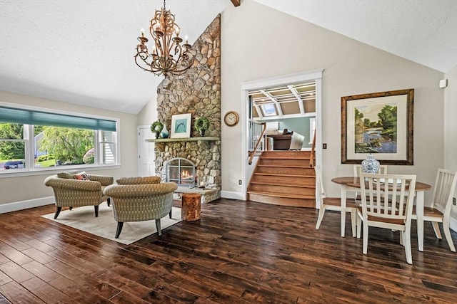 9 Wescott Rd, Andover, MA 01810 - living room with hardwood / wood-style floors, a chandelier, stairs, high vaulted ceiling, and a fireplace