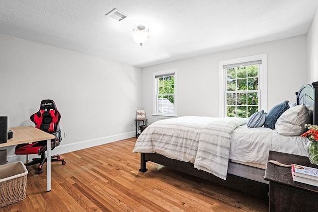 9 Wescott Rd, Andover, MA 01810 - bedroom featuring wood finished floors and baseboards