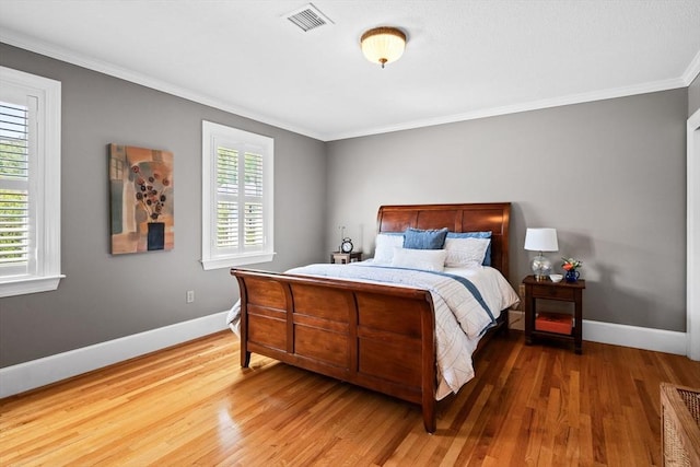 9 Wescott Rd, Andover, MA 01810 - bedroom featuring crown molding, wood finished floors, and baseboards