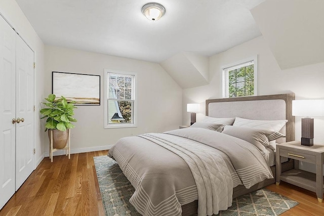 111-113 Pleasant St, Milton, MA 02186 - bedroom with wood finished floors and baseboards