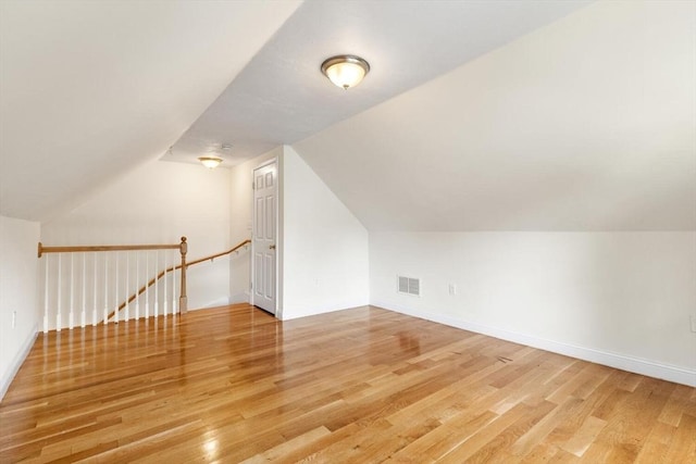 111-113 Pleasant St, Milton, MA 02186 - additional living space with light wood finished floors and lofted ceiling