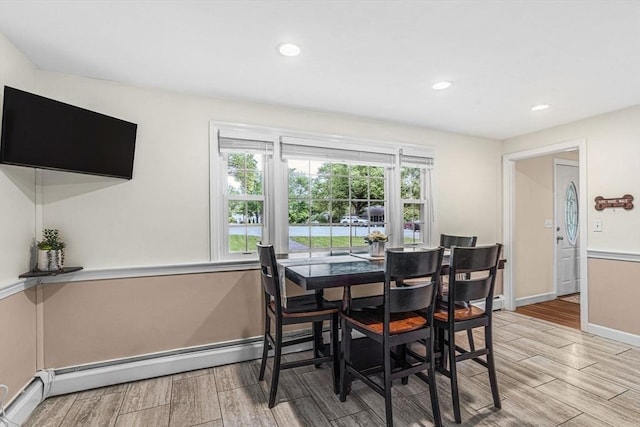23 Cherokee Rd, Acton, MA 01720 - dining room featuring wood tiled floors, baseboards, recessed lighting, and baseboard heating