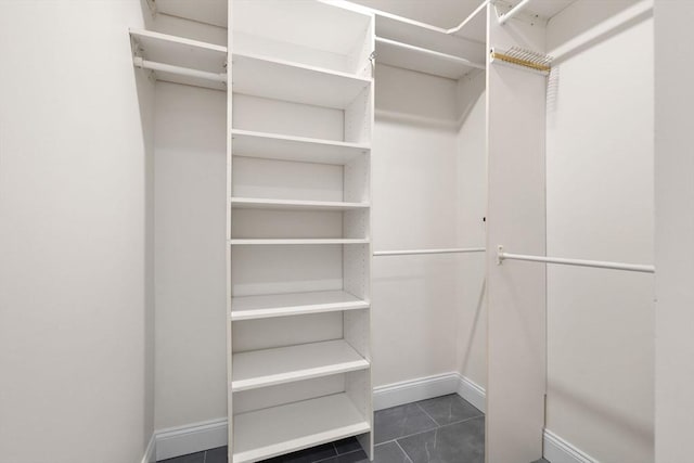 33 Sleeper St Unit 104, Boston, MA 02210 - spacious closet with dark tile patterned floors