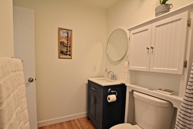 151 Bittersweet Ln Unit 208, Randolph, MA 02368 - bathroom featuring wood finished floors and vanity