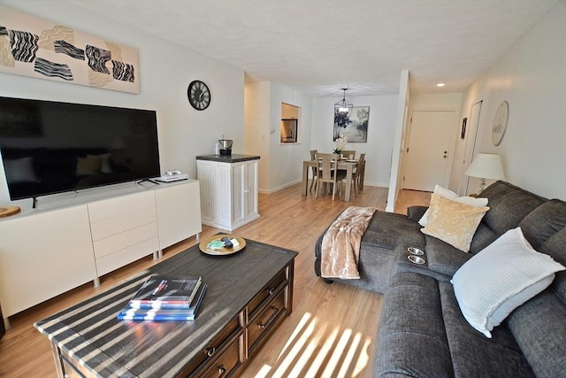 151 Bittersweet Ln Unit 208, Randolph, MA 02368 - living area featuring light wood finished floors