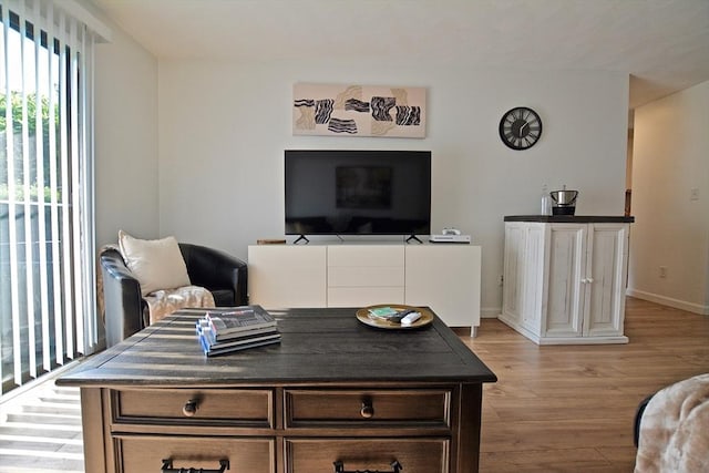 151 Bittersweet Ln Unit 208, Randolph, MA 02368 - living room with light wood-style floors and baseboards