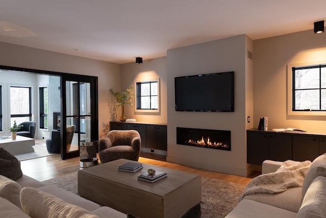 living room featuring light hardwood / wood-style flooring