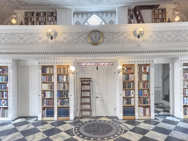 interior space with crown molding