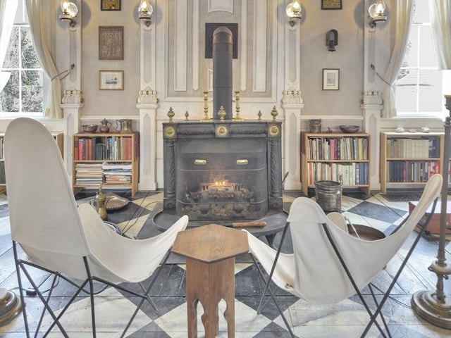 living area featuring a wood stove