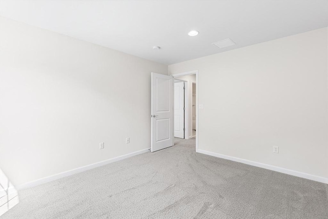 184 Stonehaven Dr, Weymouth, MA 02190 - spare room with baseboards, light carpet, and recessed lighting