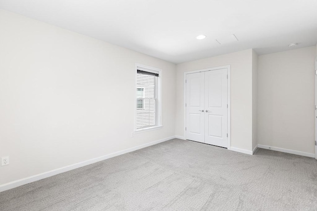 184 Stonehaven Dr, Weymouth, MA 02190 - unfurnished bedroom with carpet floors, a closet, baseboards, and recessed lighting