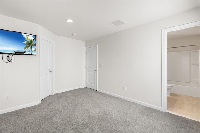 184 Stonehaven Dr, Weymouth, MA 02190 - unfurnished bedroom featuring carpet flooring, baseboards, recessed lighting, and connected bathroom