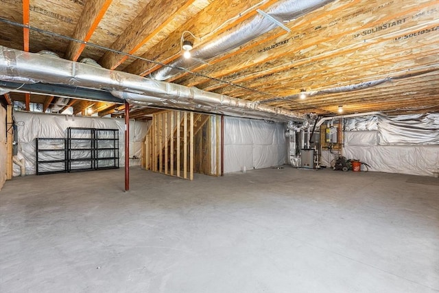 184 Stonehaven Dr, Weymouth, MA 02190 - unfinished below grade area featuring heating unit