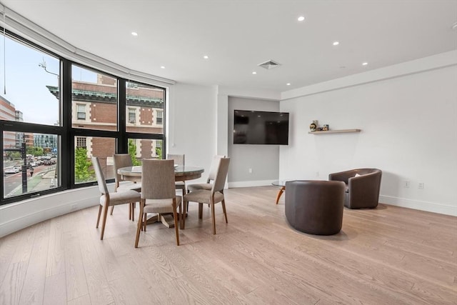 69 Walnut St Unit 4, Brookline, MA 02445 - dining space with baseboards, light wood-style flooring, and recessed lighting