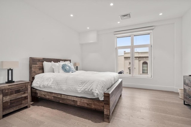 69 Walnut St Unit 4, Brookline, MA 02445 - bedroom featuring light wood-type flooring, recessed lighting, and baseboards