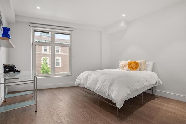 69 Walnut St Unit 4, Brookline, MA 02445 - bedroom with wood finished floors, baseboards, multiple windows, and recessed lighting