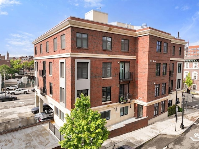 69 Walnut St Unit 4, Brookline, MA 02445 - view of property with fence