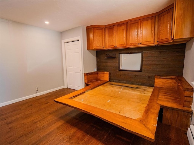 461 Aiken Ave, Dracut, MA 01826 - interior space featuring brown cabinetry, dark wood-type flooring, a baseboard heating unit, and recessed lighting