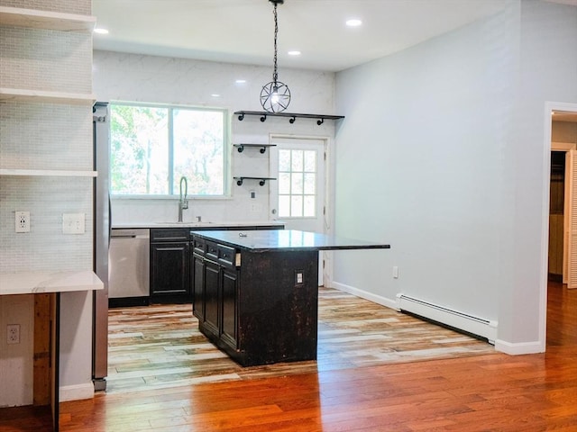 461 Aiken Ave, Dracut, MA 01826 - kitchen featuring baseboard heating, stainless steel dishwasher, dark cabinetry, light wood finished floors, and light stone counters