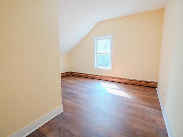 461 Aiken Ave, Dracut, MA 01826 - bonus room with a baseboard heating unit, wood finished floors, and lofted ceiling