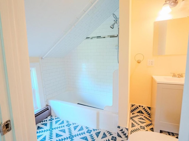 461 Aiken Ave, Dracut, MA 01826 - bathroom with baseboard heating, vanity, washtub / shower combination, tile patterned flooring, and vaulted ceiling