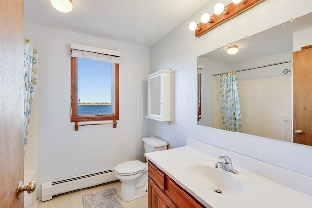 433 Shore Rd, Truro, MA 02652 - bathroom featuring vanity, tile floors, toilet, and a baseboard heating unit