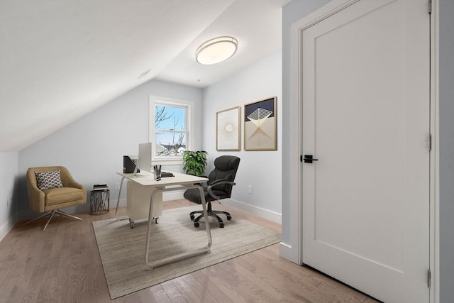 167 Charles St, Waltham, MA 02453 - office space featuring vaulted ceiling, wood finished floors, and baseboards