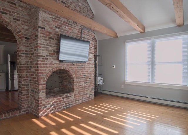 unfurnished living room featuring arched walkways, beam ceiling, baseboard heating, a brick fireplace, and hardwood / wood-style floors