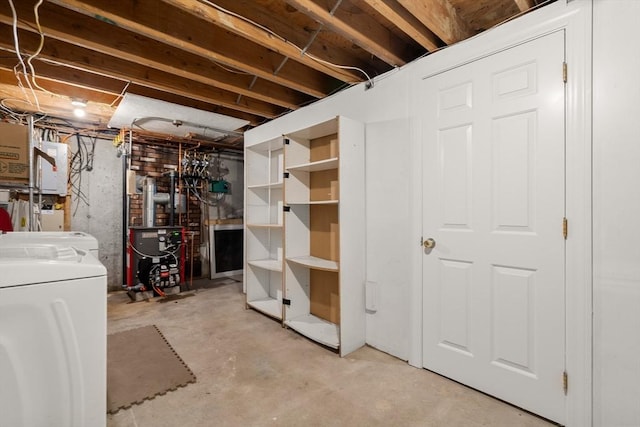 basement with washing machine and clothes dryer