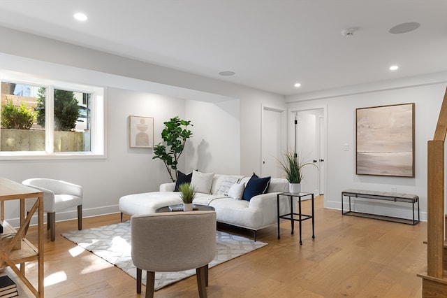 living room with light hardwood / wood-style floors