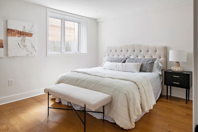 bedroom featuring wood-type flooring