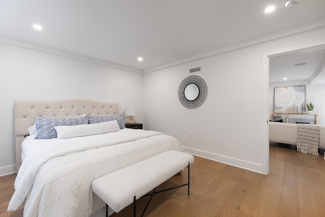 bedroom featuring light hardwood / wood-style flooring