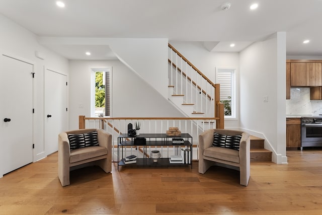 sitting room with light hardwood / wood-style floors