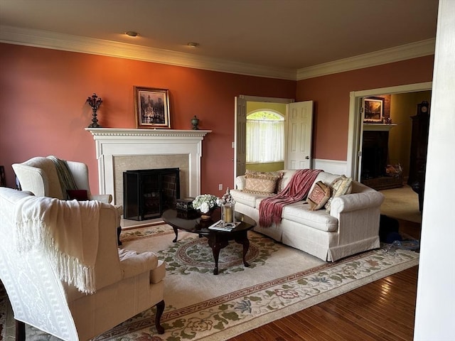 6 Everett Cir, Hopkinton, MA 01748 - living area featuring crown molding, wood finished floors, and a fireplace