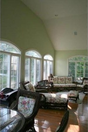 6 Everett Cir, Hopkinton, MA 01748 - living room with high vaulted ceiling and wood finished floors
