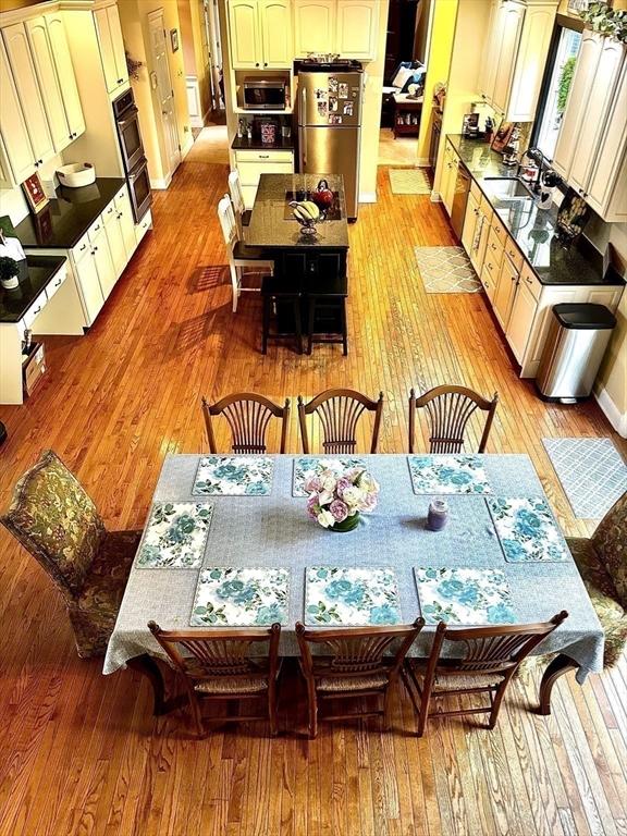 6 Everett Cir, Hopkinton, MA 01748 - dining space featuring light wood-style flooring